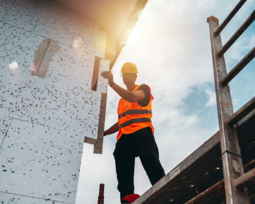 Polystyrene Thermal Cladding For Energy Saving On A Construction Site